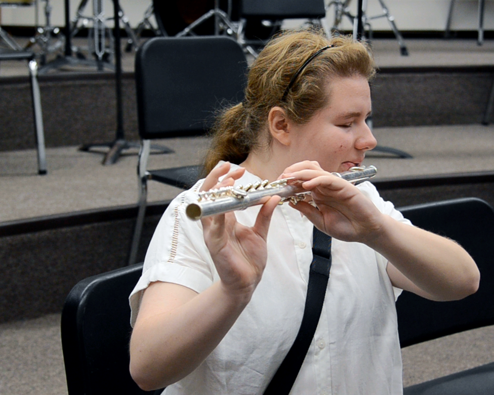 Rachel Harris plays the flute