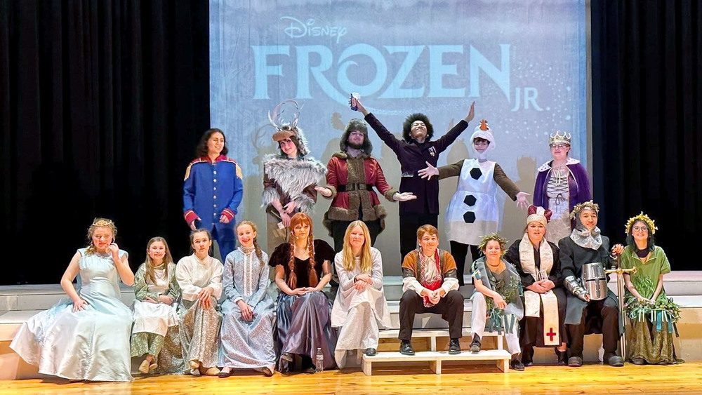 Cast of Frozen Jr. poses for a photo