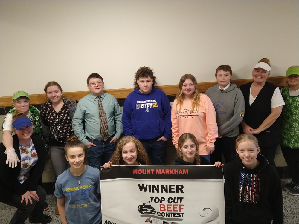 Photo #1: Mount Markham Middle School’s Top Cut Beef Contest winners with the cafeteria staff, who helped the team with their project. Students are: (back row) Kihana Eccleston, Kaden Derby, Dillon Bosch, Keira Mowers and Cole Piechowicz; (front row) Amelia Seelman, Natalee Griffiths, Savannah Wilcox and Grace Assisi; (missing) Landon Youngkrans.