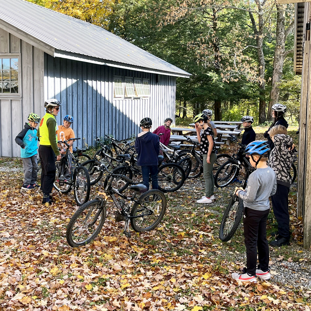 students stop bikes for a talk