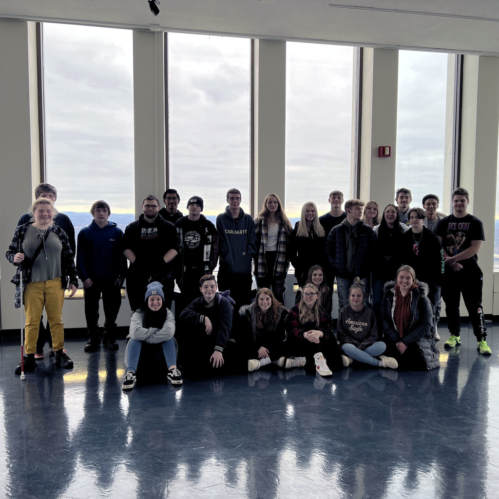 Seniors pose for a group photo in the Observation Deck