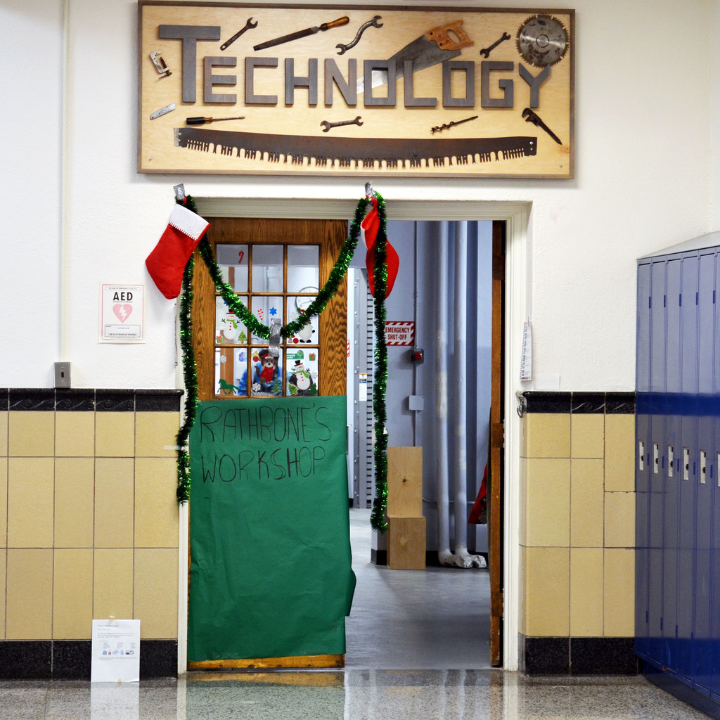 Mr. Rathbone's Technology Classroom decorated with stockings and garland