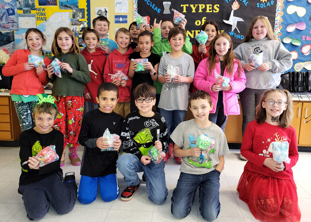 Students pose with their hygiene goodie bags