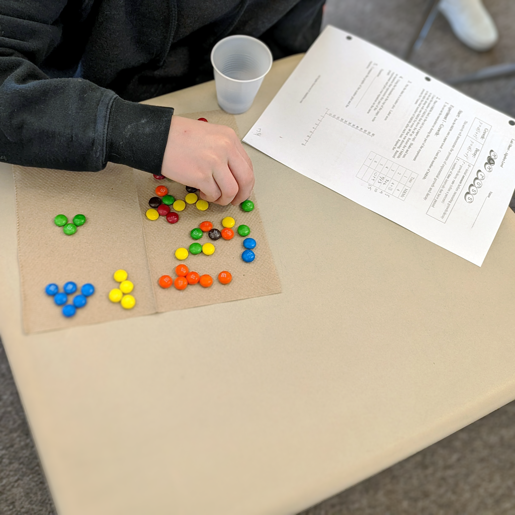 students use M&M's to learn about exponential growth and decay