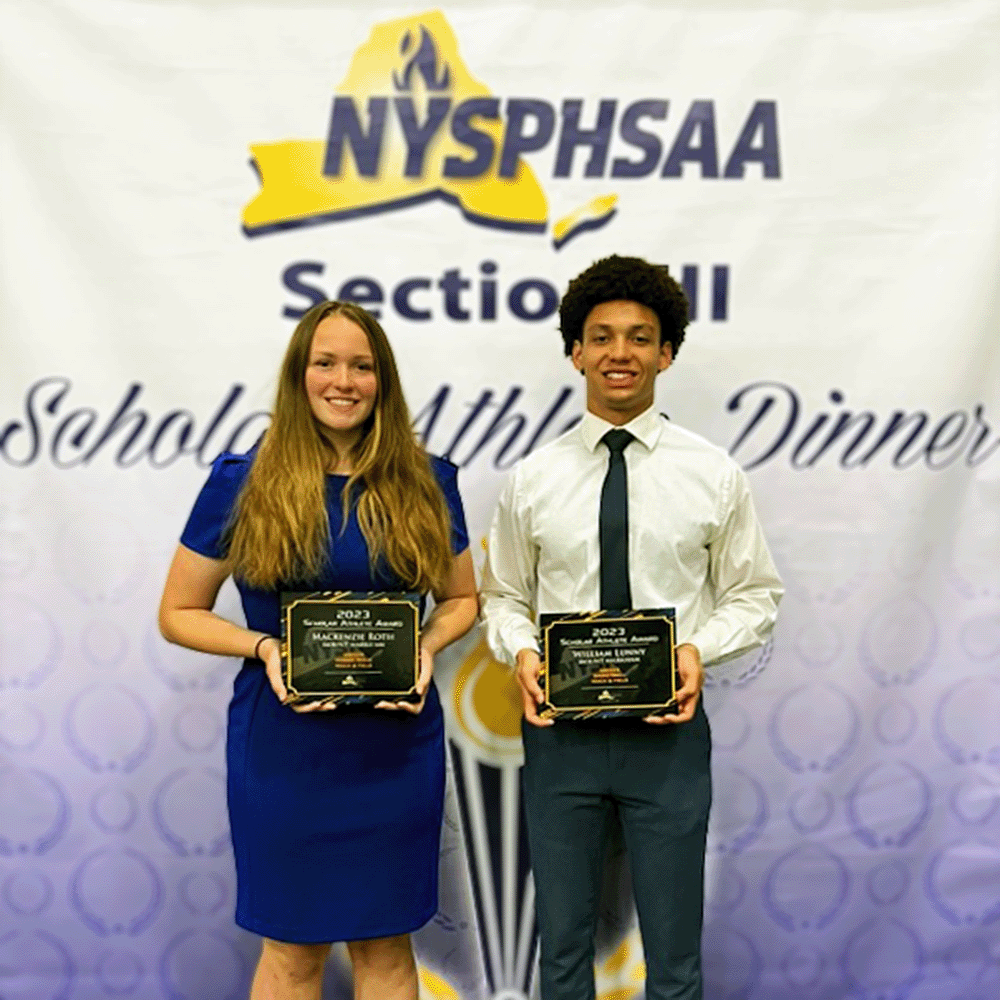 Mackenzie and Will pose with awards