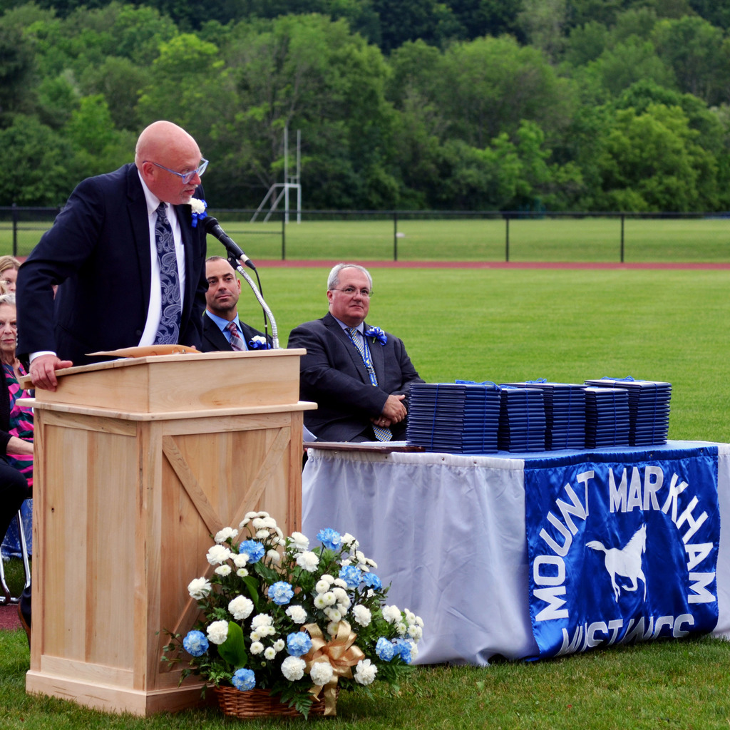 Chuck Chafee speaks as the 2023 Hall of Fame Inductee
