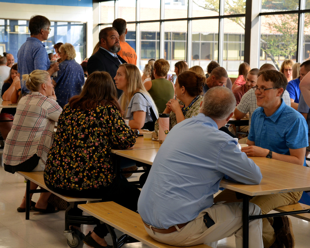 Staff mingles over breakfast