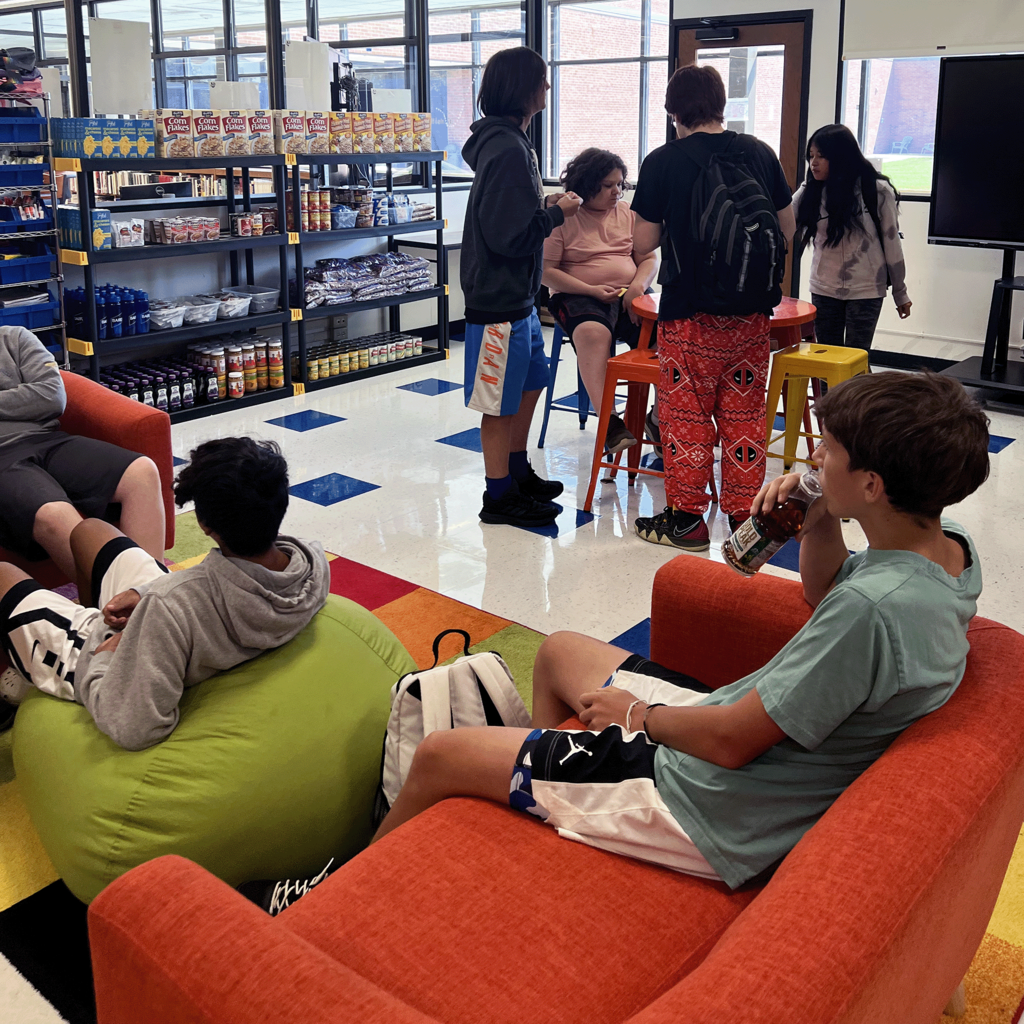 students hang out in the HUB